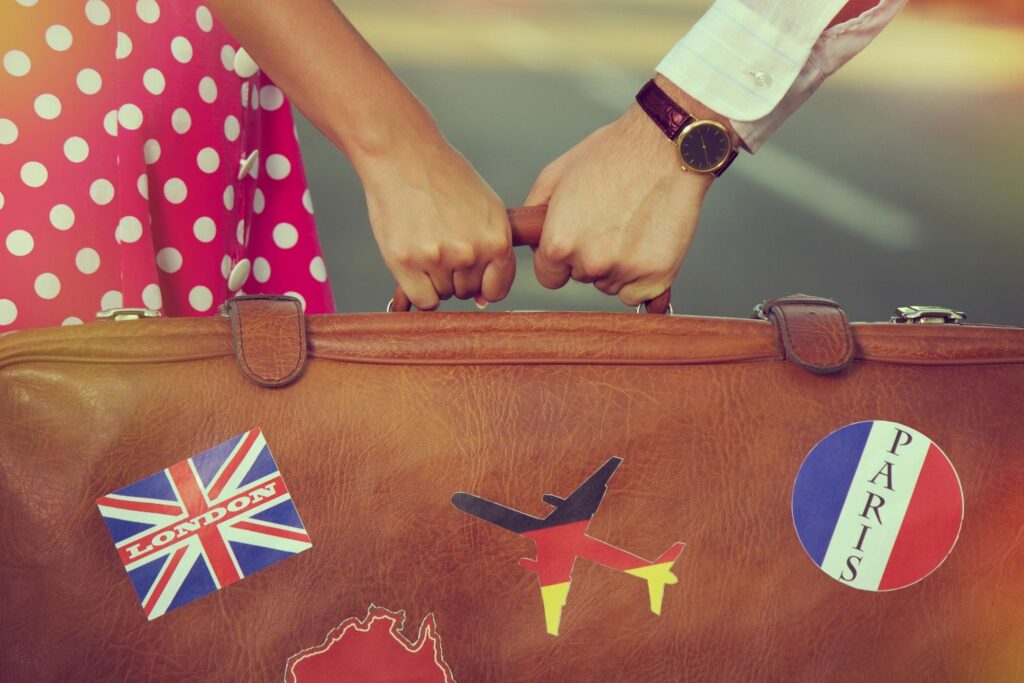 A suitcase with stickers on it