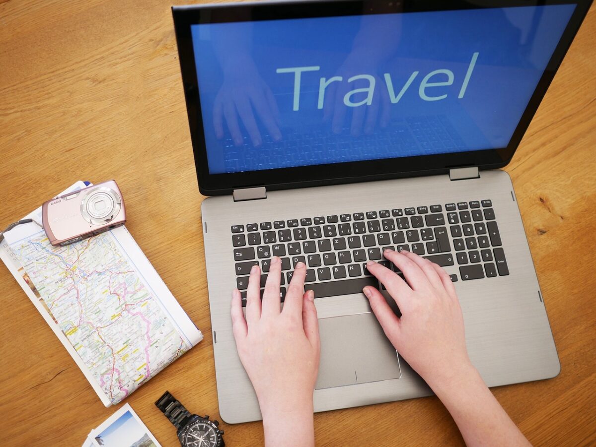 travel planning with laptop