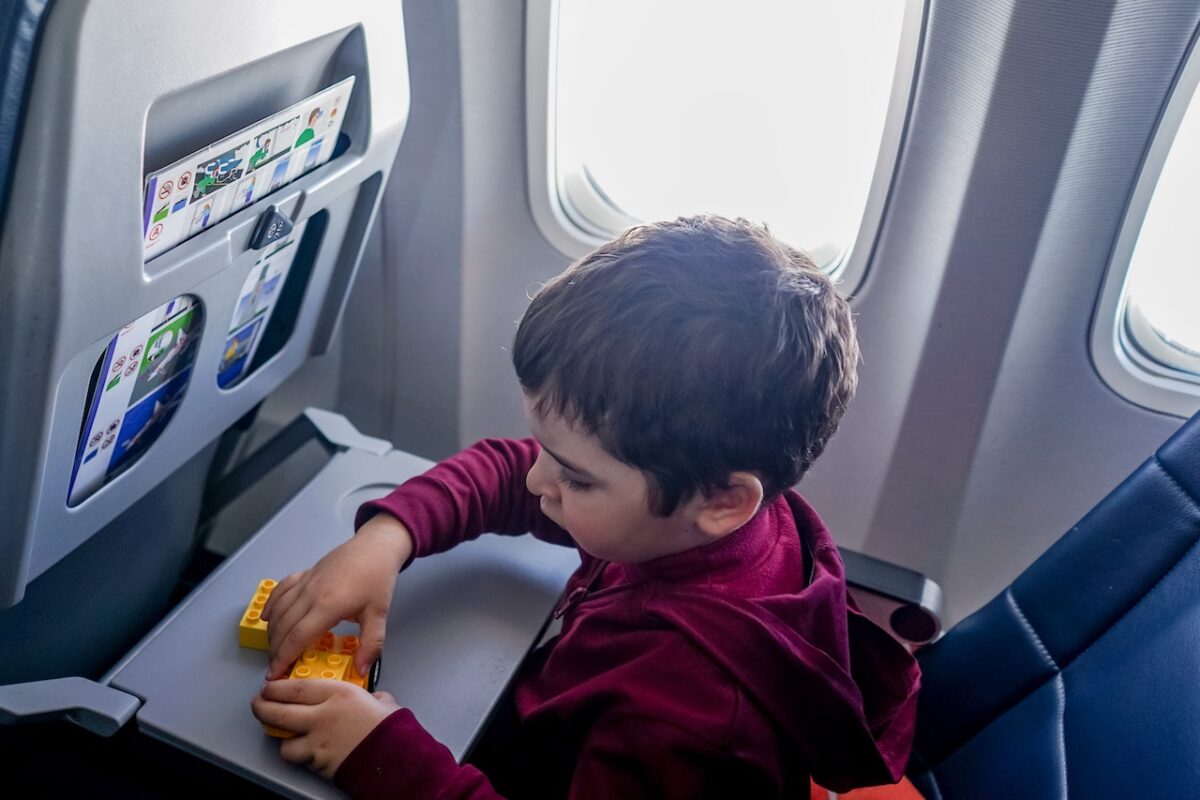 boy passenger on airplane