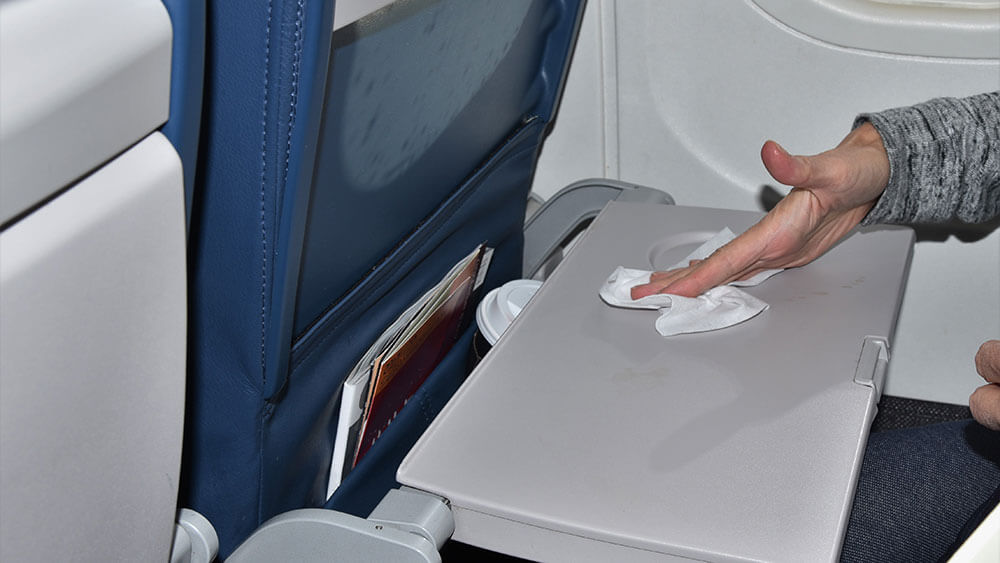 sanitize airplane tray table